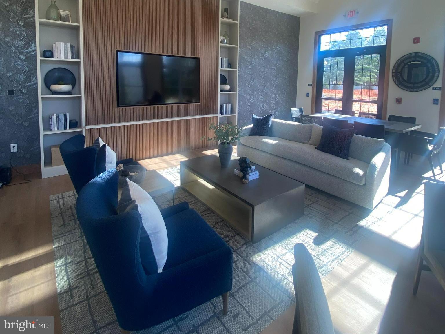 8 Cherry Lane Cranbury, NJ 08512 - Photo 15 of 15 a living room with furniture and a flat screen tv