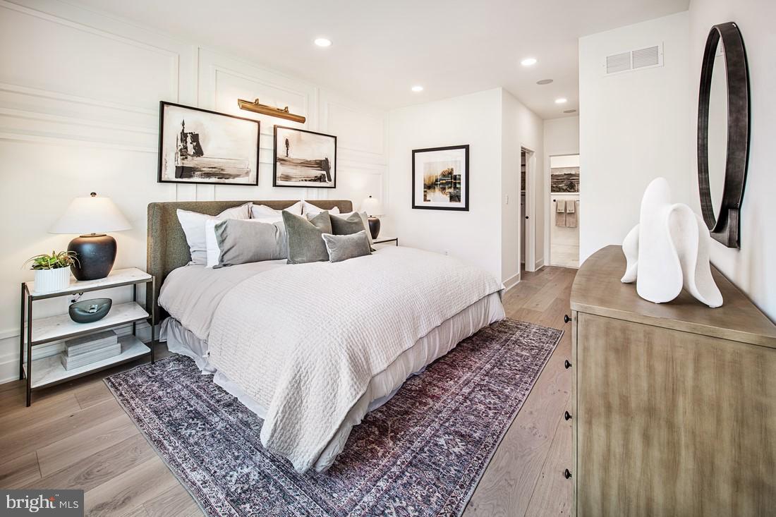 8 Cherry Lane Cranbury, NJ 08512 - Photo 5 of 15 a bedroom with bed and wooden floor