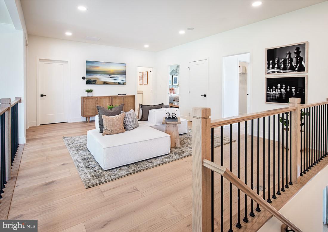8 Cherry Lane Cranbury, NJ 08512 - Photo 7 of 15 a living room with furniture wooden floor and a flat screen tv