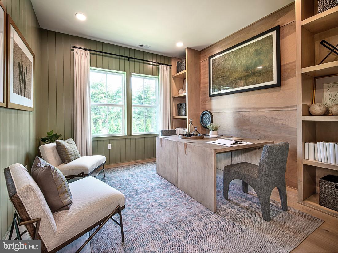 8 Cherry Lane Cranbury, NJ 08512 - Photo 8 of 15 a living room with furniture a window and a flat screen tv