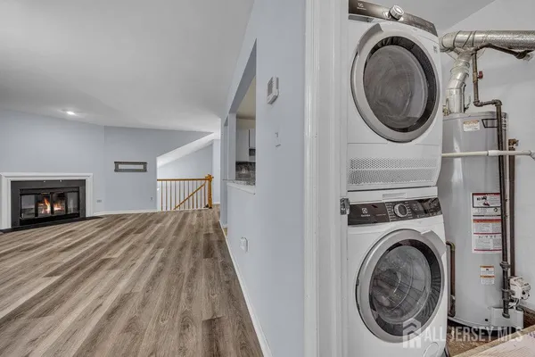a view of a hallway with washer and dryer