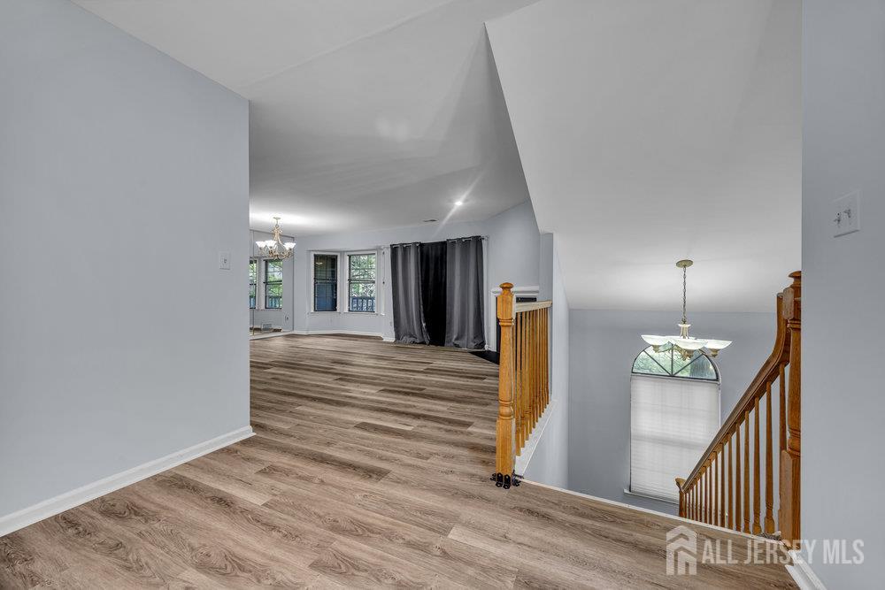 604 Woodhaven Drive Edison, NJ 08817 - Photo 27 of 38 a view of a hallway view with staircase