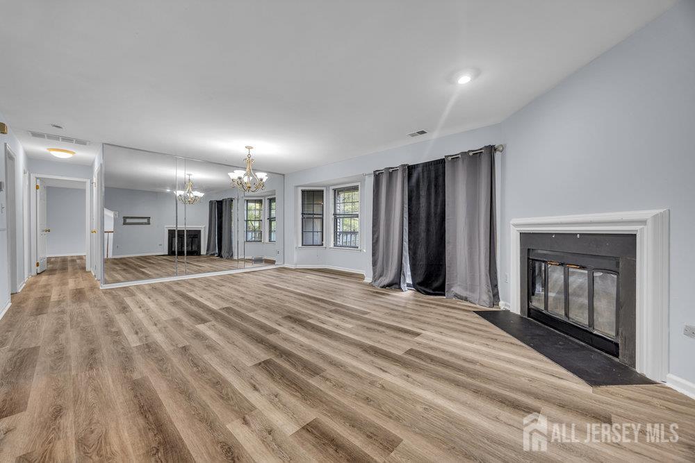 604 Woodhaven Drive Edison, NJ 08817 - Photo 33 of 38 a view of a livingroom with a fireplace