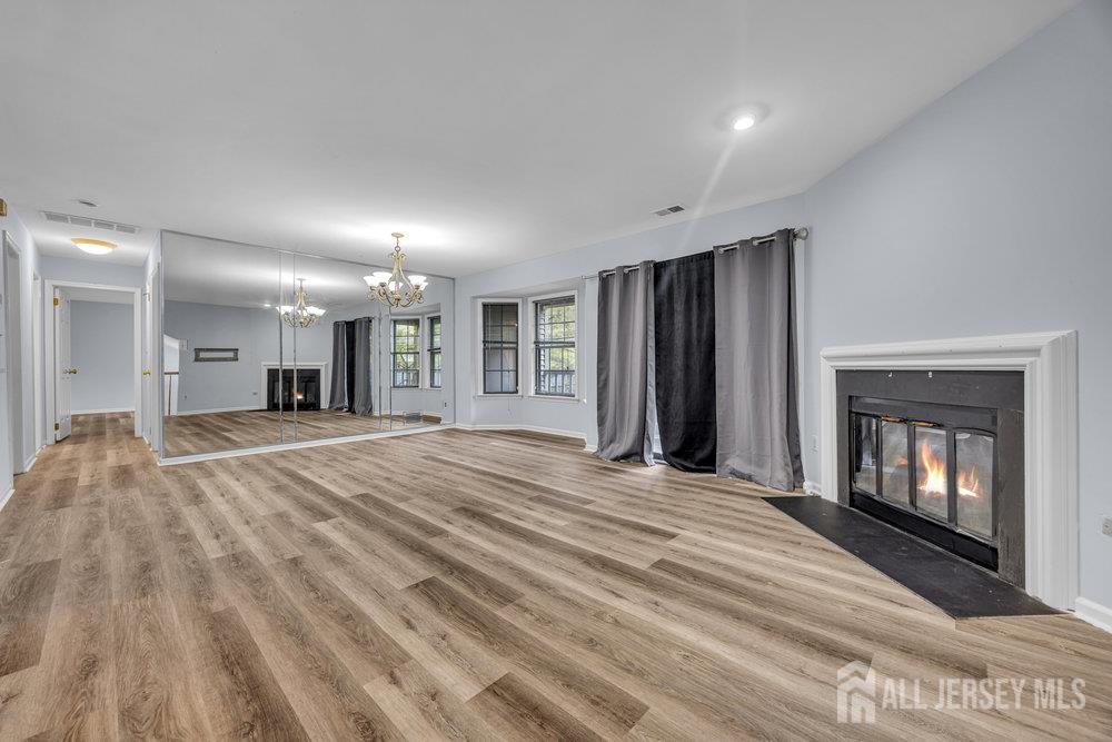 604 Woodhaven Drive Edison, NJ 08817 - Photo 5 of 38 a view of a livingroom with a fireplace