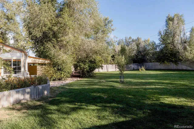 a garden view with a seating space