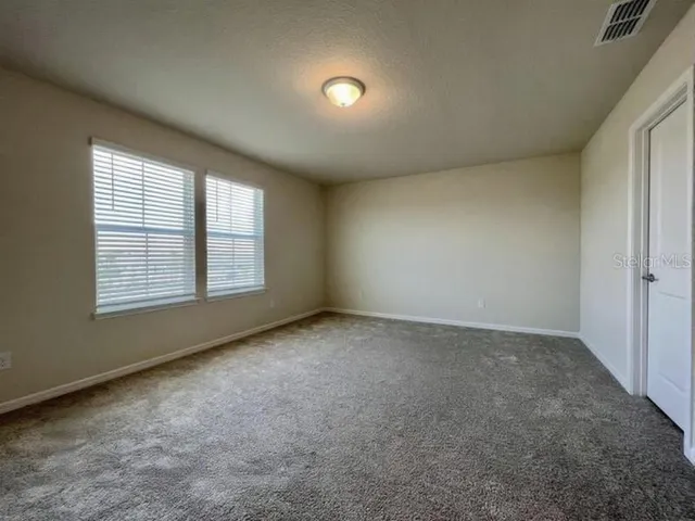 an empty room with an entryway