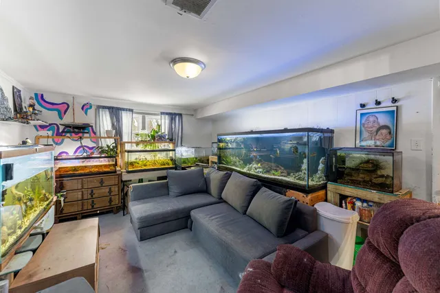 a view of a patio with table and chairs