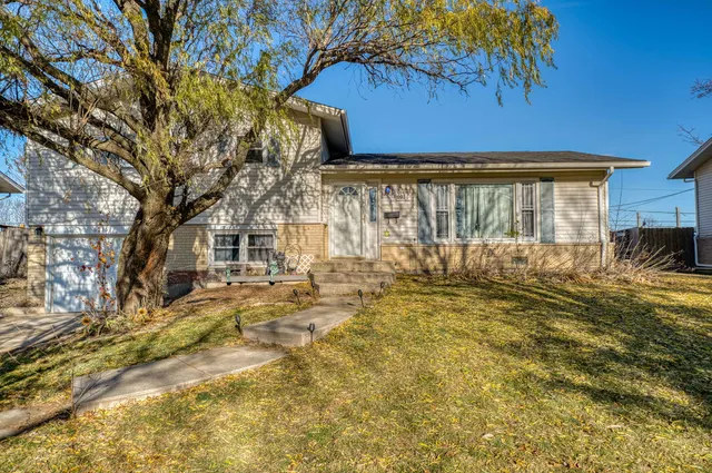 a view of a backyard of the house