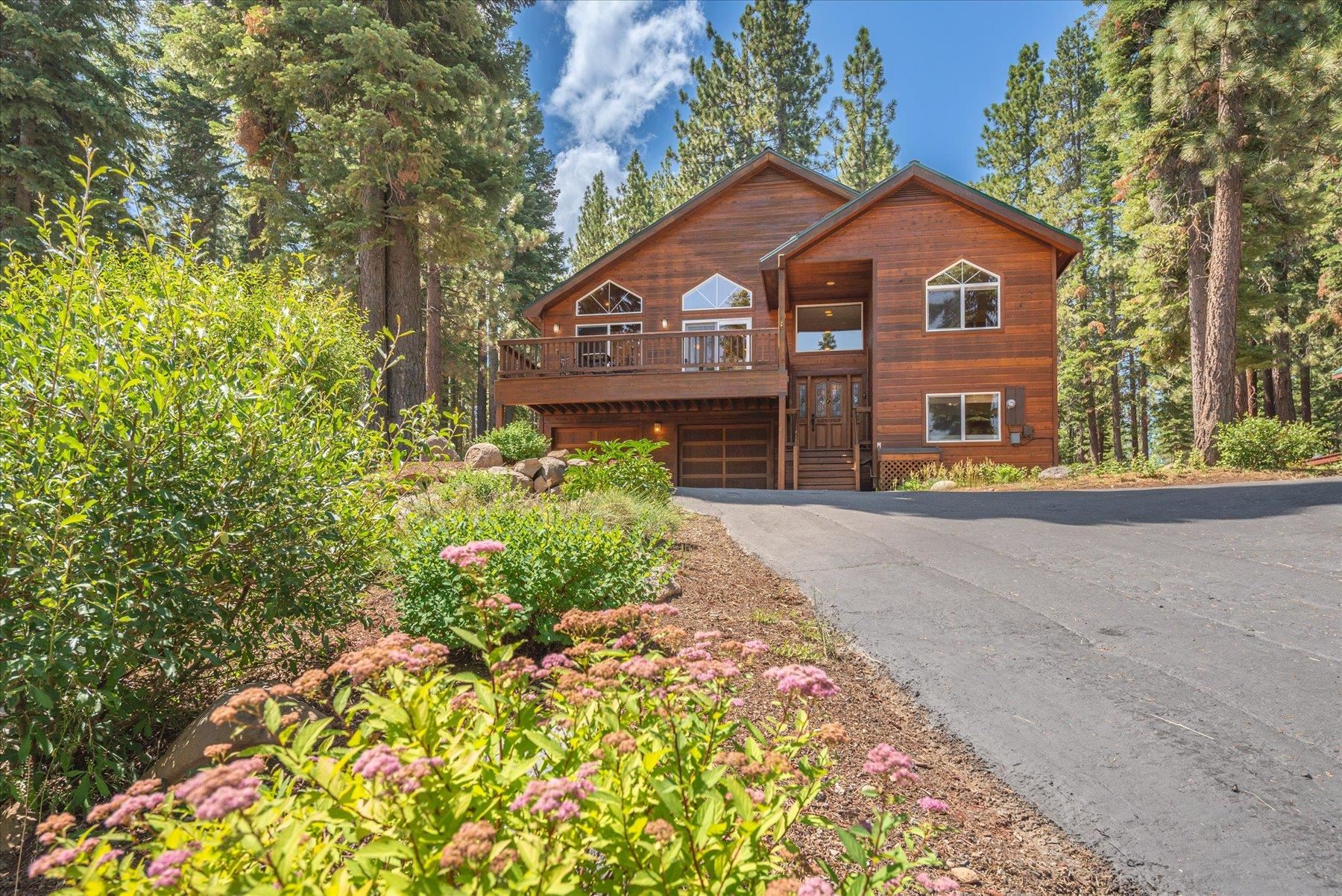 14265 Hansel Avenue Truckee, CA 96161 - Photo 19 of 21 a front view of a house with a yard