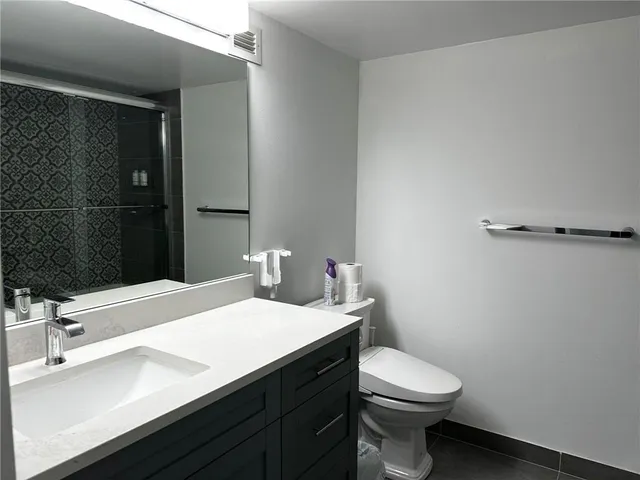 a bathroom with a sink and a toilet