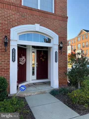 a front view of a house with yard