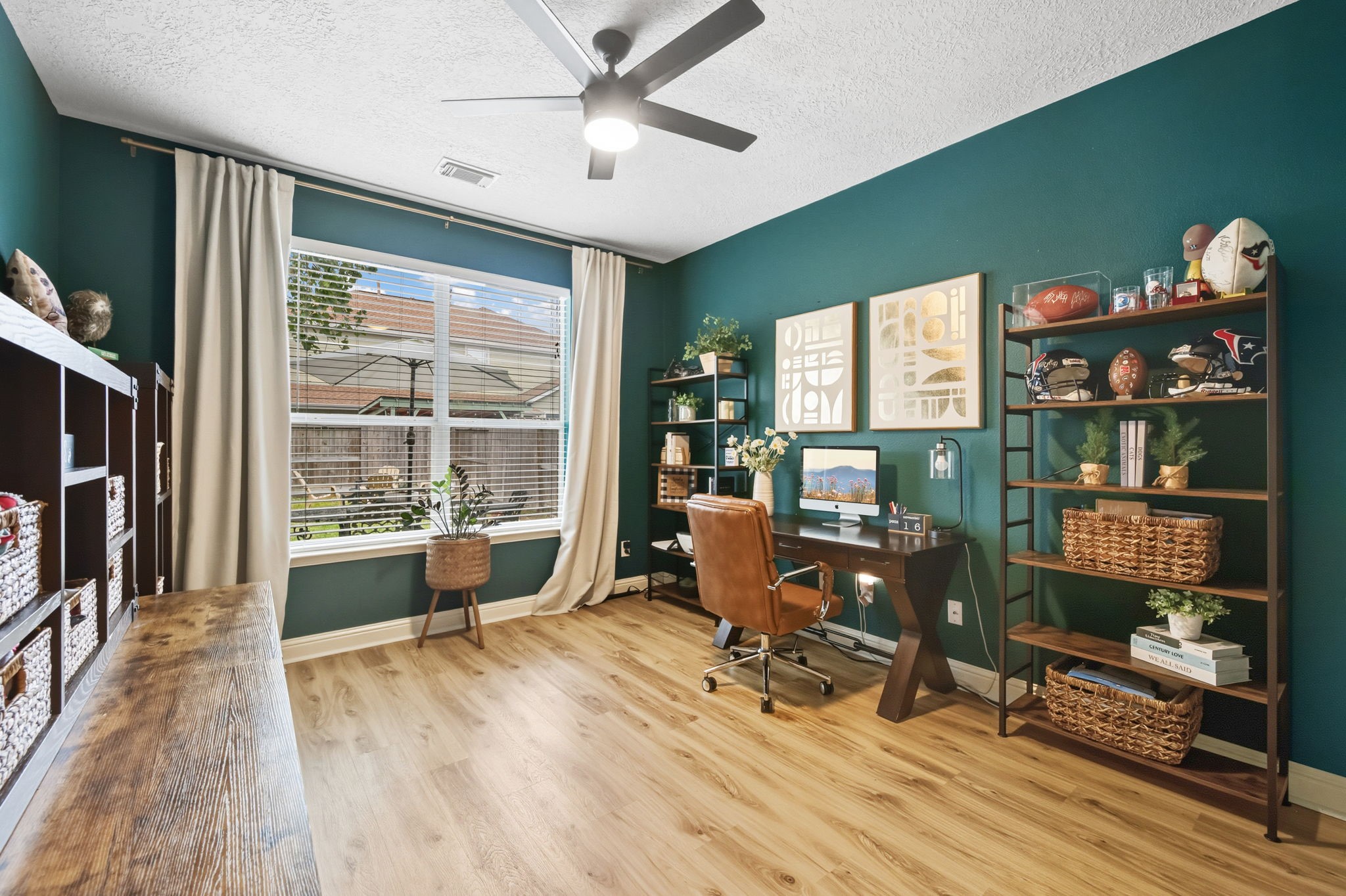 29631 Legends Line Drive Spring, TX 77386 - Photo 18 of 35 a view of a workspace with furniture and a window