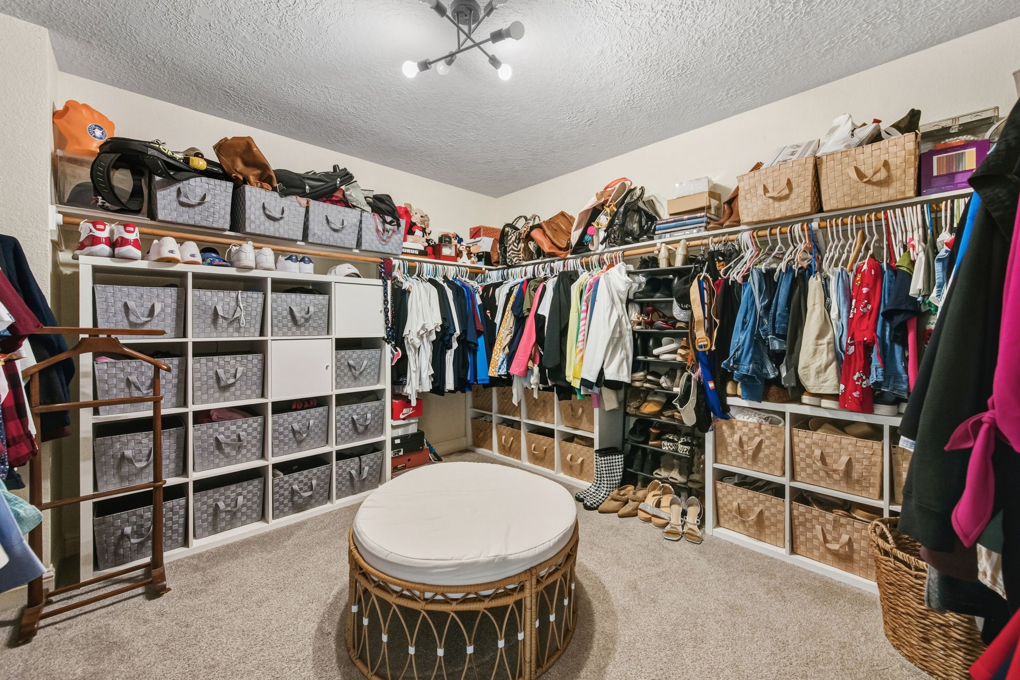 29631 Legends Line Drive Spring, TX 77386 - Photo 26 of 35 a view of walk in closet with clothes and shoes