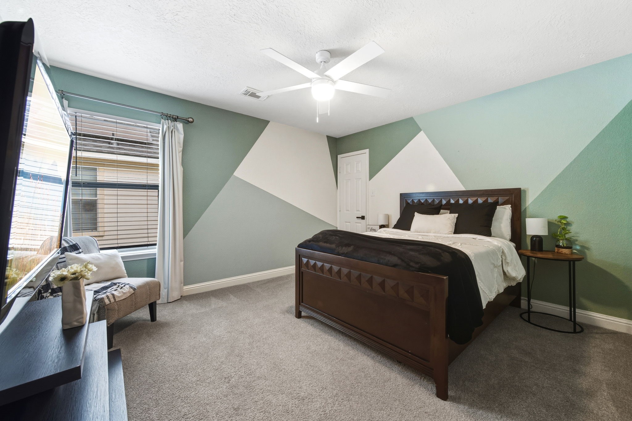 29631 Legends Line Drive Spring, TX 77386 - Photo 28 of 35 a bedroom with a bed and a large window