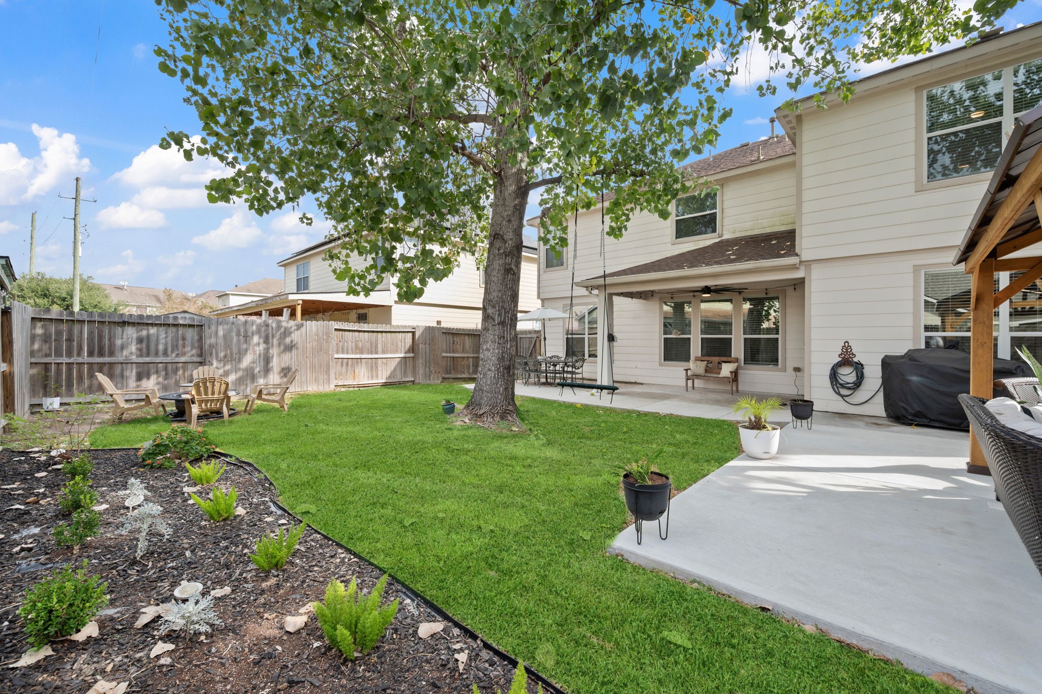 29631 Legends Line Drive Spring, TX 77386 - Photo 33 of 35 a view of a house with backyard and a tree