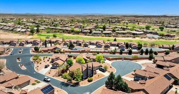an aerial view of a city with lots of residential buildings