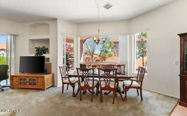 a view of a livingroom with furniture window and outside view