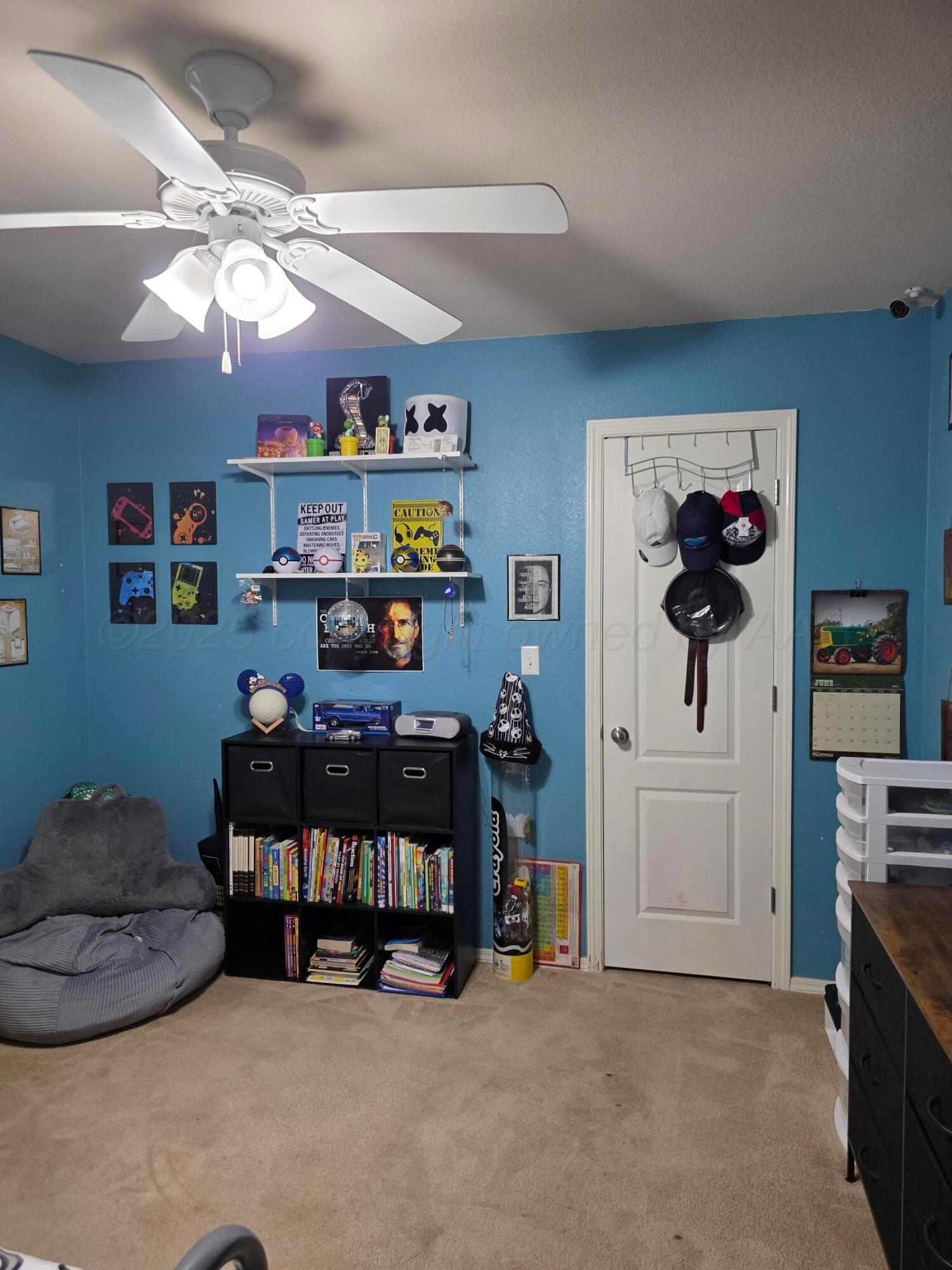 4808 Mammoth Lane Amarillo, TX 79110 - Photo 8 of 15 a living room with furniture and a chandelier