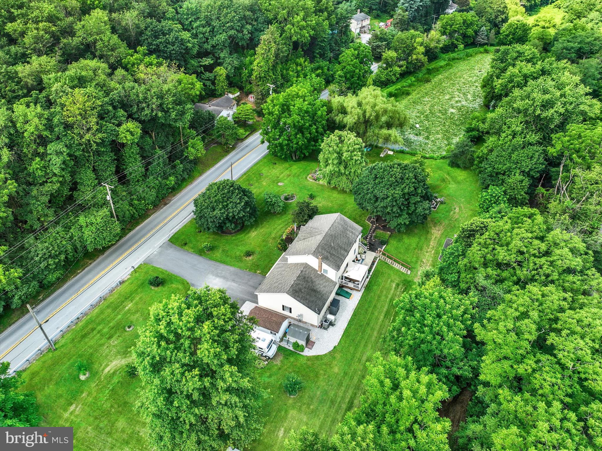 1665 Craley Road Windsor, PA 17366 - Photo 50 of 69 a view of a garden with a sitting area