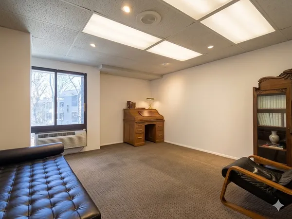a view of empty room with windows