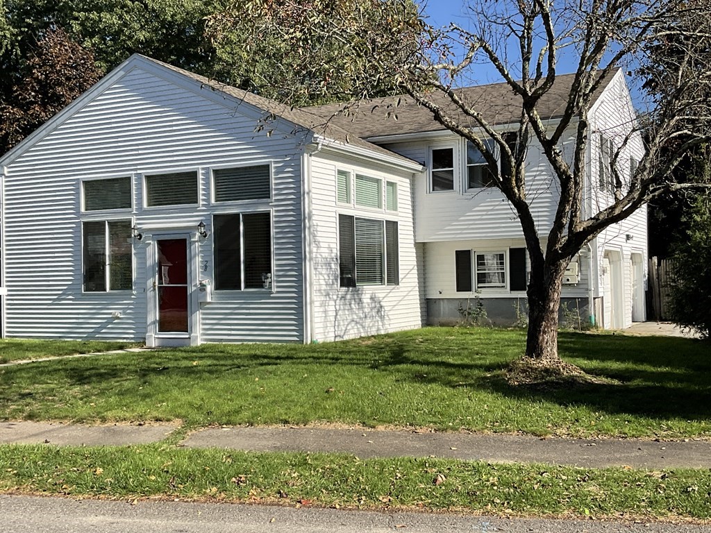 28 Standish Road Needham, MA 02492 - Photo 1 of 29 a front view of a house with a yard