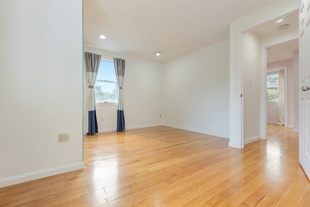 28 Standish Road Needham, MA 02492 - Photo 12 of 29 a view of empty room with wooden floor