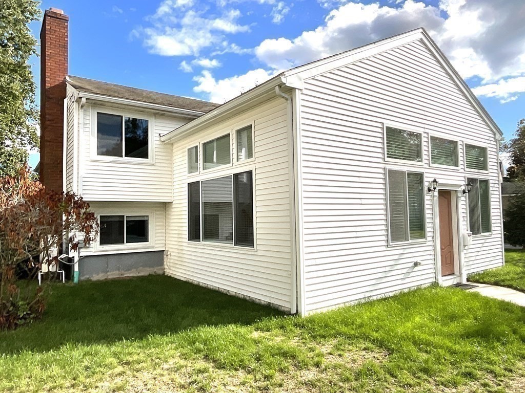 28 Standish Road Needham, MA 02492 - Photo 24 of 29 a view of a house with a yard
