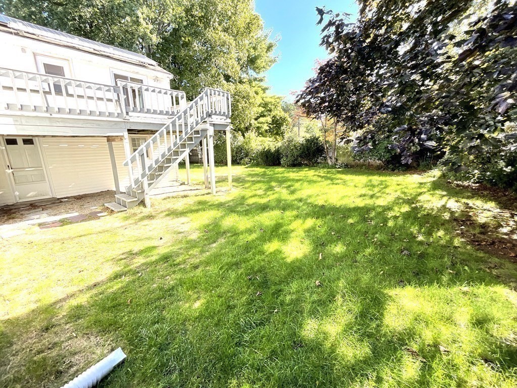 28 Standish Road Needham, MA 02492 - Photo 25 of 29 a view of a swimming pool with an outdoor space