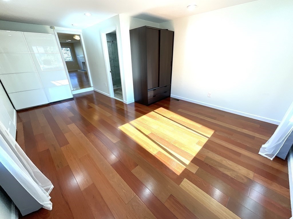 28 Standish Road Needham, MA 02492 - Photo 9 of 29 a view of a room with wooden floor