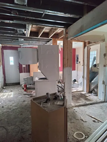 a room with furniture and a window