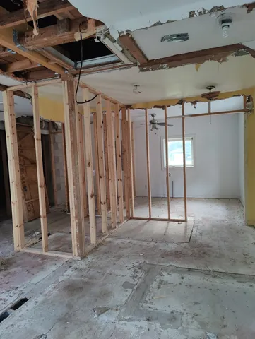 an empty room with windows