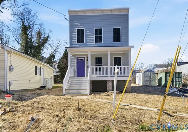 a front view of a house with a garage