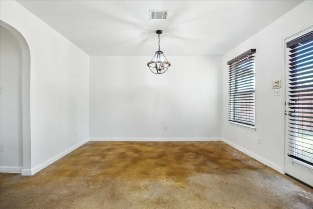 a view of a room with windows