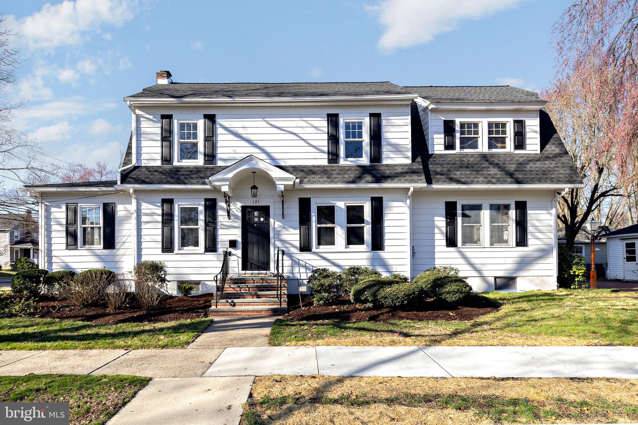 131 Marne Avenue Haddonfield, NJ 08033 - Photo 2 of 33 a front view of a house with a yard