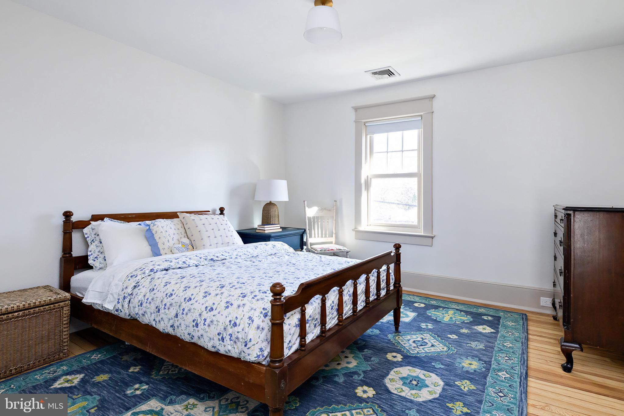 131 Marne Avenue Haddonfield, NJ 08033 - Photo 26 of 33 a bedroom with a bed a flat tv screen and a dresser