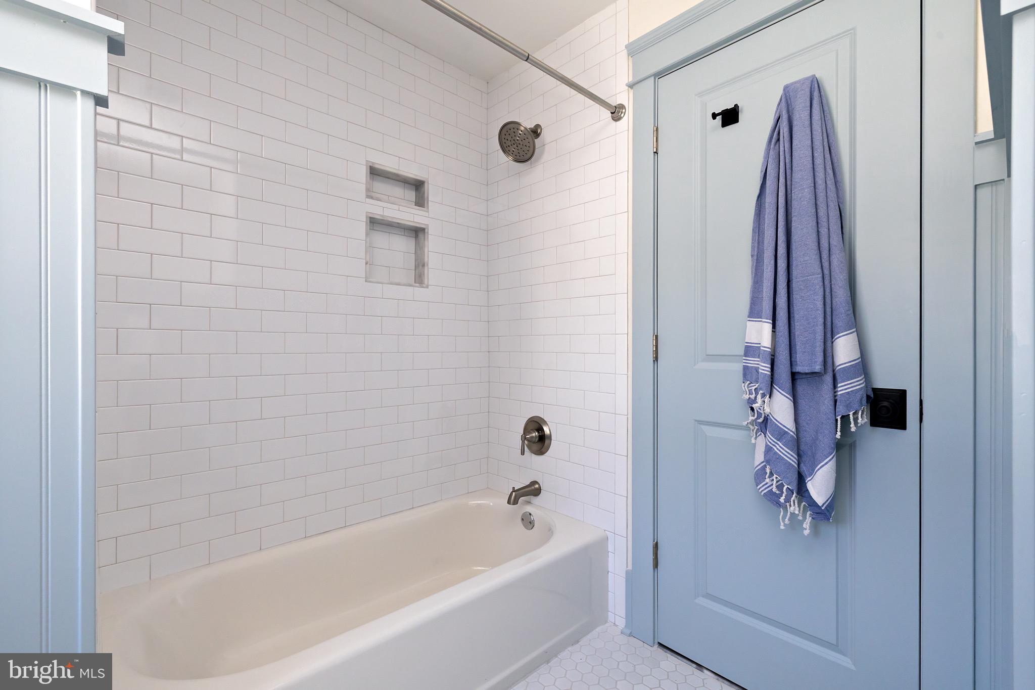 131 Marne Avenue Haddonfield, NJ 08033 - Photo 28 of 33 a bathroom with a bathtub and a shower
