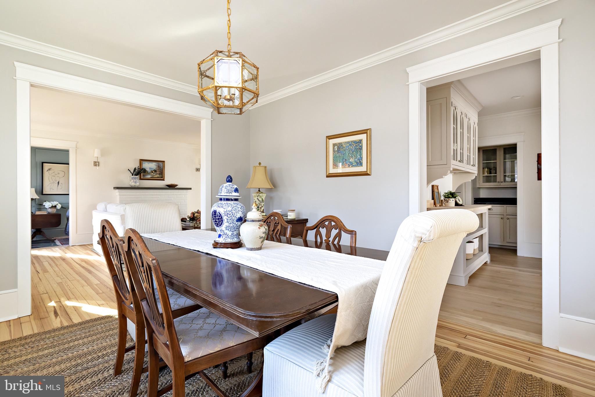 131 Marne Avenue Haddonfield, NJ 08033 - Photo 10 of 33 a dining room with furniture a chandelier and wooden floor