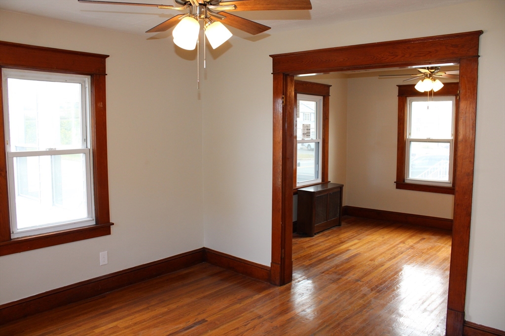 32 Kent Road Springfield, MA 01129 - Photo 13 of 30 a view of an empty room with wooden floor and a window