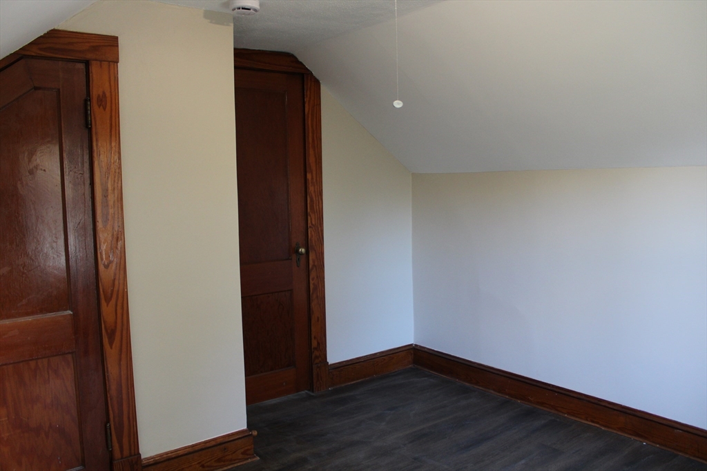 32 Kent Road Springfield, MA 01129 - Photo 19 of 30 an empty room with wooden floor and closet