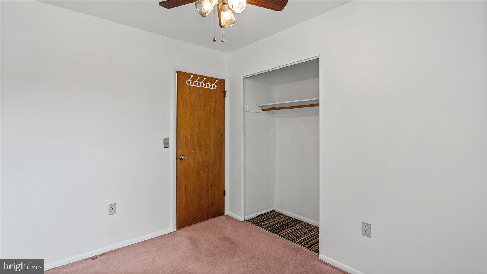 1802 Larch Drive Edgewood, MD 21040 - Photo 17 of 33 an empty room with a empty space and chandelier fan