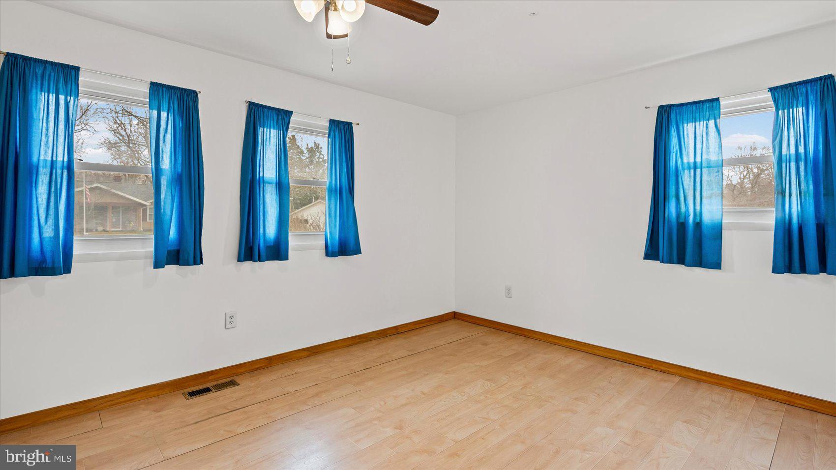 1802 Larch Drive Edgewood, MD 21040 - Photo 19 of 33 a view of an empty room with windows