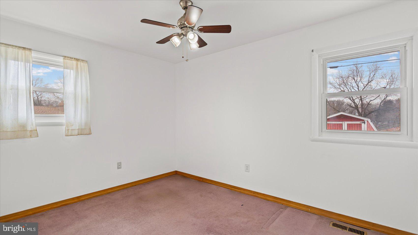 1802 Larch Drive Edgewood, MD 21040 - Photo 20 of 33 an empty room with windows and fan