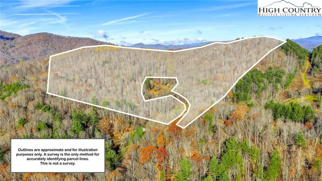 a view of a chair and table on the wooden floor