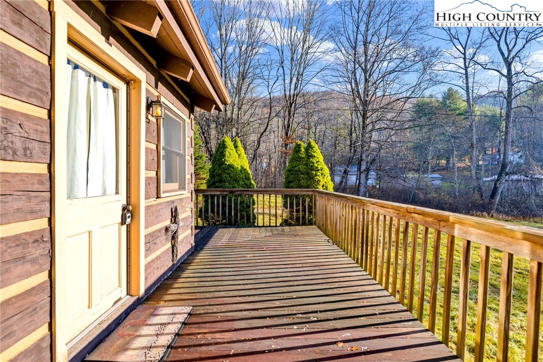 1451 Elliott Road West Jefferson, NC 28694 - Photo 11 of 33 a view of a balcony with wooden floor