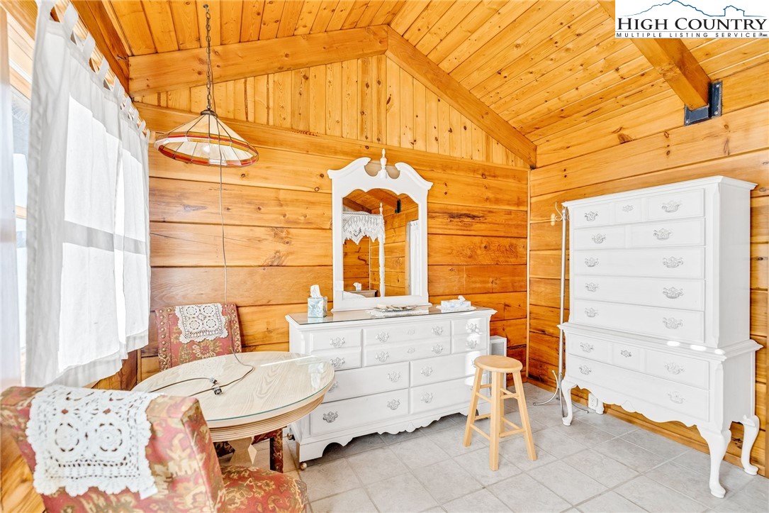 1451 Elliott Road West Jefferson, NC 28694 - Photo 22 of 33 a bedroom with a bed and a table