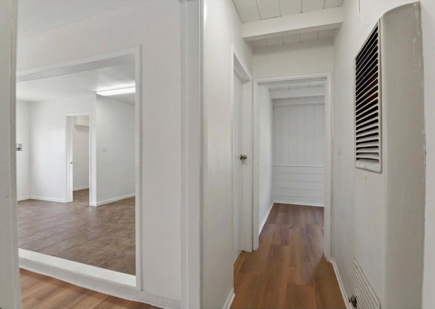 18601 Keswick Street, Unit B Reseda, CA 91335 - Photo 15 of 16 a view of a hallway with wooden floor