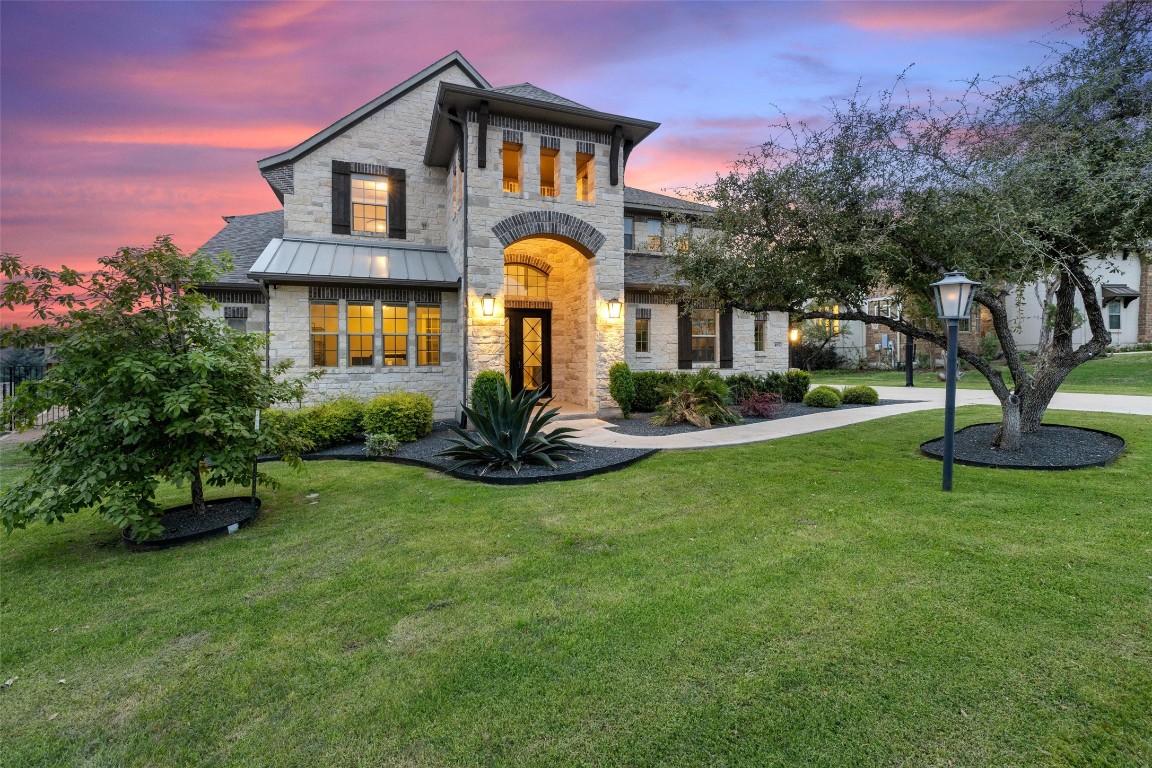 Gorgeous custom home by Westin Homes in highly sought after Lakeside at Rough Hollow on Lake Travis.