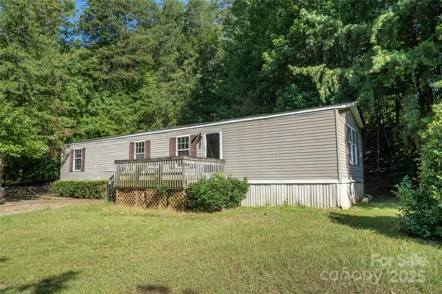 a house that has tree in front of it