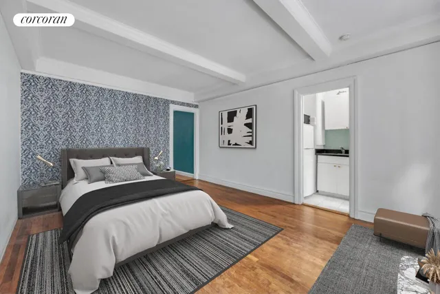 a bedroom with bed and night stand