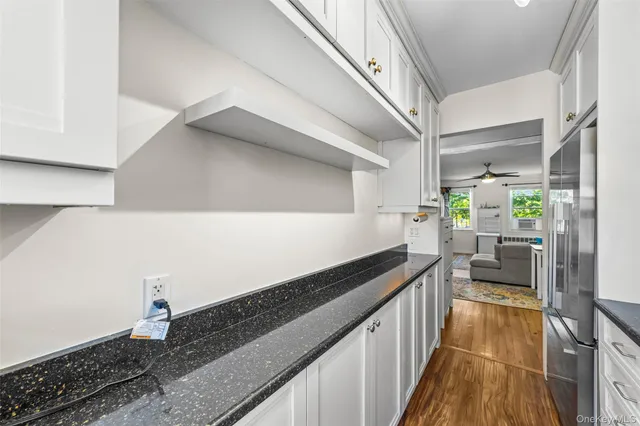 a kitchen with granite countertop lots of counter top space